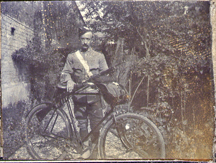 A cyclist with his bike